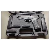 M&P 9mm with 1 15rd magazine + grips, case & mags