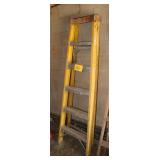 yellow fiberglass ladder