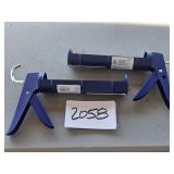 NEW - 2 caulking guns