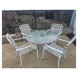 outdoor table & 4 chairs - some rust on arms