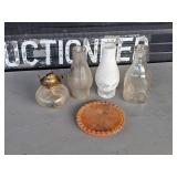 oil lamp, shimneys, pink plate, milk bottle