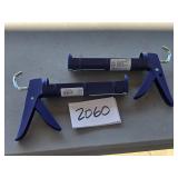 NEW - 2 caulking guns