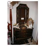 Oriental themed dresser with mirror and contents