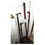 2 dress canes and 2 walking sticks