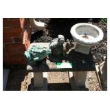 Flower urn, concrete squirrel and garden frog