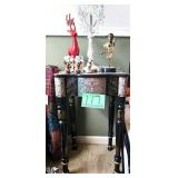 black wooden accent table, candlestick lamp