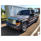 2006 JEEP COMMANDER - 
4 DOOR WAGON - 4WD - V8, 4.7L ENGINE - BLACK - MPV - SEIZURE CAR - FRONT TWO DOOR GLASS WINDOWS MISSING - TAPE GLUE ON DRIVER SIDE  - FEW PAINT PECKS ON CAR AND HOOD - TRAILER 