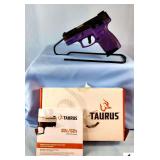 TAURUS INTERNATIONAL G2C PISTOL - 9MM CAL - SEMI-AUTO - BLACK OVER PURPLE - SLIGHT STAIN OVER GRIP - IN BOX WITH BOOK & LOCK - EXCELLENT CONDITION - S/N ABB295390