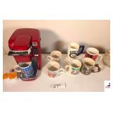 KEURIG COFFEE MAKER - (7) COFFEE CUPS - COFFEE CARAFE - STAINLESS COFFEE CUP