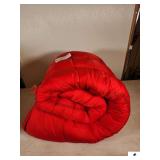 RED 100% POLYESTER FILLED SLEEPING BAG-. (TRAILER)