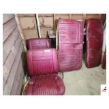 (2) RED BUCKET CAR SEATS- (1) REAR SEAT- (2) ARM REST- REAR BACK PANEL- SHOW DETERIORATION- SEAT EDGES SPLIT