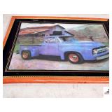 PICTURE OF OLD BLUE TRUCK IN METAL FRAME- FRAME BROKEN- PEOPLE