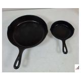 (2) CAST IRON SKILLETS- (1) 9" SKILLET- (1) 5" SKILLET- BOTH SEASONED AND CLEAN
