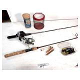 (2) FISHING POLES-(1) ZEBCO 404- (1) DAIWA ST 750- (2) CRICKET CAGES- LURES
