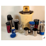 ELECTRIC ICE CREAM FREEZER - ASSORTMENT OF TUMBER CUPS - TURVIS CUPS - COFFEE MUGS - STAINLESS THERMOS - MILLER LITE COOZIE - GLASS BEER MUG