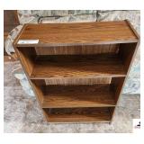 4 SHELF BOOKCASE- 25" X 10" X  35"   ( trailer)