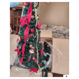 6FT POP UP CHRISTMAS TREE W/ ORNAMENTS (4) STRANDS RED LIGHTS- BAG OF RED BALL ORNAMENTS- BOX OF GOLD AND RED MISC ORNAMENTS- LED FLAG DISPLAY- WORKS- PARTIAL ROLLS OF CHRISTMAS & BIRTHDAY WRAPPING PA