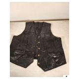 BLACK GENUINE LEATHER VEST (BACK DAMAGED) (LEFT IN CLOSET)