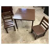 Kids wooden table with two chairs