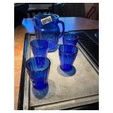 Blue pitcher and 4 glasses
