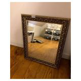 Gold framed beveled mirror