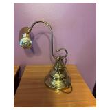Brass curved headed lamp