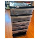 Plastic storage tote with Christmas contents