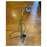 Table mounted lighted magnifying glass