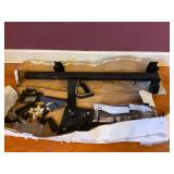 Floor mounted gun holder