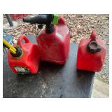 3 plastic gas jugs