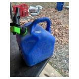 5 gallon gas jug blue with 3/4 full