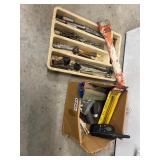Assorted tools and walkie-talkie