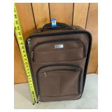 Protocol, Brown rolling suitcase