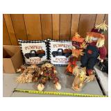 Pumpkin patch pillows and assorted scarecrows