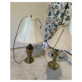 2 brass toned lamps