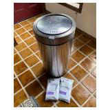 Flip top trashcan and bags