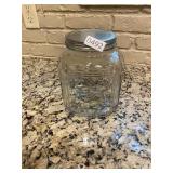 Large glass jar with metal lid