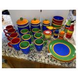 Large lot of colorful dishes