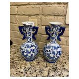2 blue and white vases
