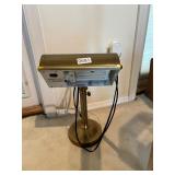 Brass toned desk lamp