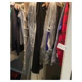 Closet of mostly womenï¿½s clothing & shoes