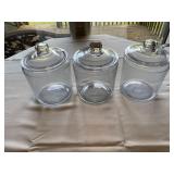 Three glass jars with lids