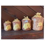 Set of 4 vintage butterfly canisters