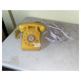 Vintage yellow rotary phone