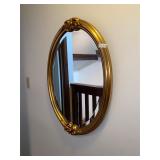 Oval mirror with flower