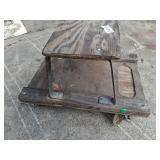 small wooden roller seat