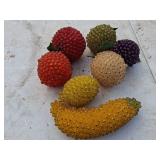 box of plastic fruit