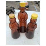 3 vintage Mrs. Buttersworth amber bottles