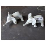 2 small pearlidecent elephants