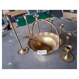 brass basket and various sized candle holders